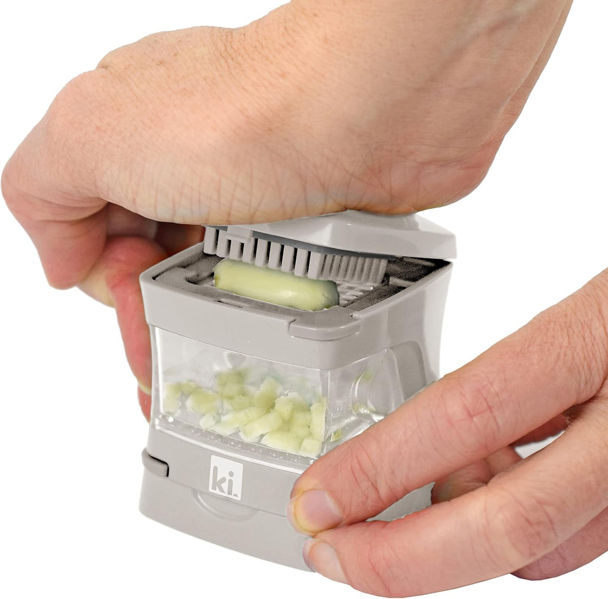 Garlic-A-Peel Garlic Press, Crusher, Cutter, Mincer, and Storage Container - Includes Silicone Garlic Peeler - Easy to Clean - Stainless Steel Blades – (Cream), standard - Culinary Roots