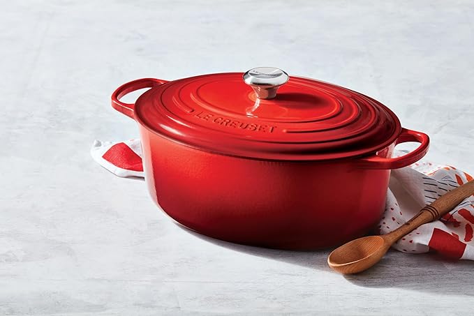 Le Creuset Enameled Cast Iron Signature Oval Dutch Oven, 5 qt, Cerise